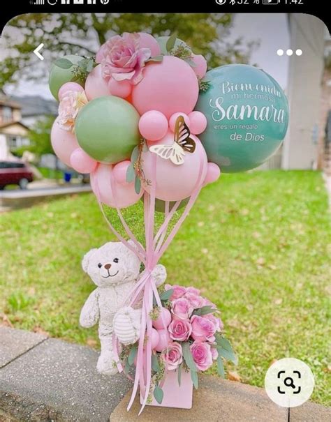 A Teddy Bear Holding Balloons And Flowers In It S Mouth With The Words