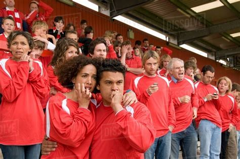 Nervous Fans At Football Match Stock Photo Dissolve