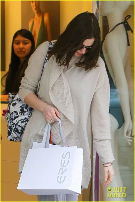 Pregnant Anne Hathaway Steps Out For Some Holiday Shopping Photo