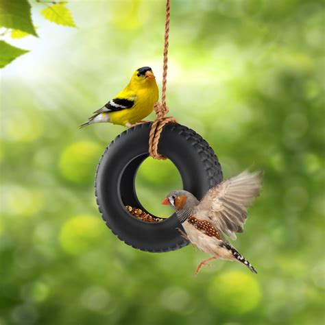 A diy bird feeder doesn't get more charming than this repurposed tea cup and saucer. SwingTime - Ceramic Tire Swing Bird Feeder - The Green Head