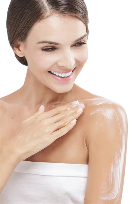 Beautiful Woman Applying Body Lotion To Her Arms Smiling Stock Photos Free Royalty Free