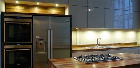 Handleless kitchens are very popular now in the wide choice of finishes available. Black Rok installation in Brighton, handleless kitchen ...