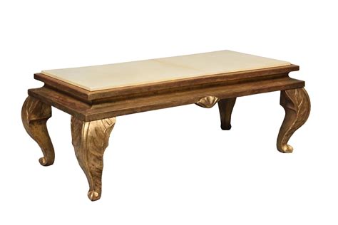 The result is a striking piece of furniture that would bring levity. Gilt wood coffee table - Maison Jansen - Ref.78026