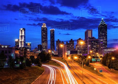 Usa Georgia Atlanta City Skyline At Dusk Stock Photo Dissolve