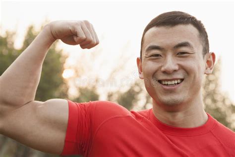 Muscular Man Flexing Bicep Stock Image Image Of Active 31689215