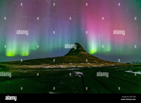 The Northern Lights Aurora Borealis At Kirkjufell Iceland Stock Photo