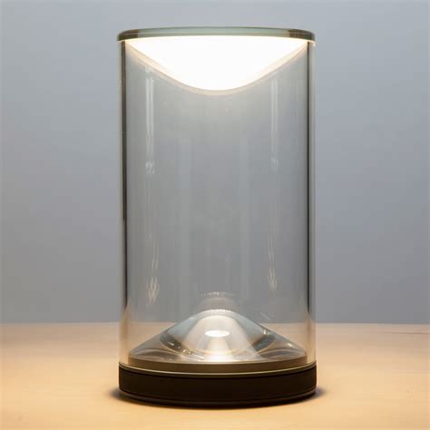 Foster Partners Introduces Eva Tabletop Light With Candle Like Glow