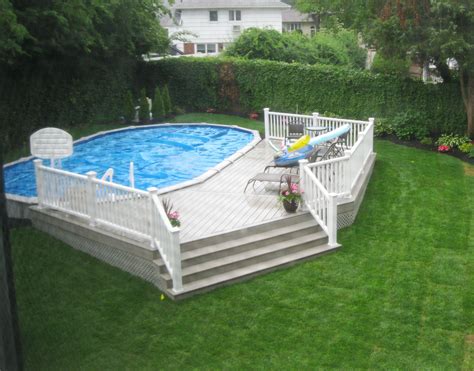 18x33 Semi Inground Pool With Deck Above Ground Pool Landscaping Above