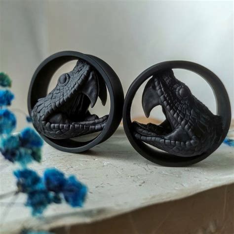 a pair of ouroboros ear tunnels unique lightweight double etsy