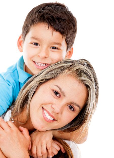 Happy Boy With His Mother Smiling Isolated Over A White Background