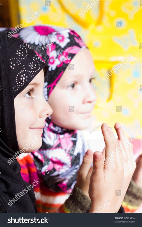 Two Little Muslim Girls Praying With Hands Up Stock Photo 87225736