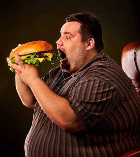 Fat Man Eating Fast Food Hamberger Breakfast For Overweight Person