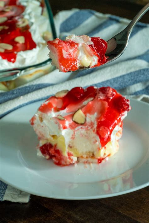 · heaven on earth cake with delicious layers of angel cake, sour cream pudding, cherry pie filling, whipped topping, and almonds. Heaven On Earth Cake - 12 Tomatoes