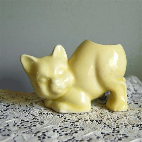 These planters are ideal for smaller plants, and they do not come with drainage holes so that you you can learn more about this planter here. Vintage Cat Cactus Planter by Morton | Flickr - Photo Sharing!