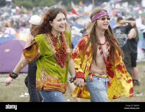 Two Visitors Pictured At Woodstock Festival In Kostrzyn Poland 03