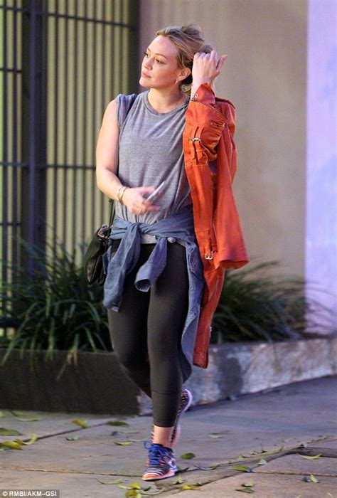 Hilary Duff Shows Off Her Trim Physique In Leggings And Orange Jacket Daily Mail Online