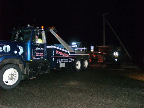 Towing With Ol' Blue - Totman Enterprises - Auto Repair, Foreign