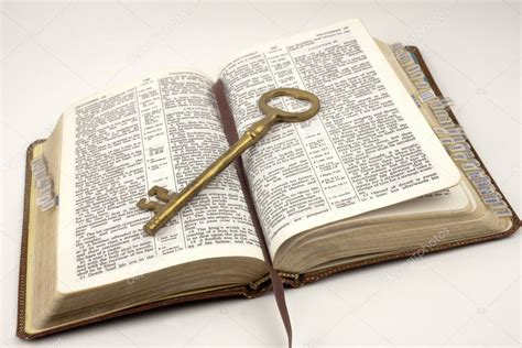 Opened Bible With Golden Key — Stock Photo © Enigmangels 10809404
