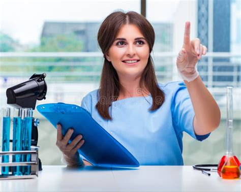 Young Woman Pressing Buttons In Lab Stock Image Image Of Digital