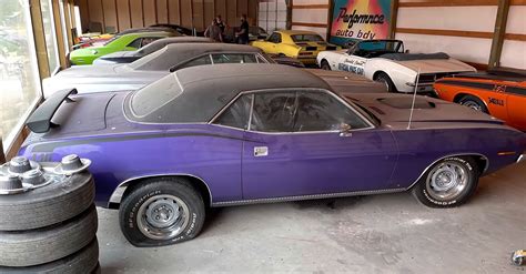 Big Barn Opens Up To Reveal Stash Of Rare Muscle Cars Challengers And