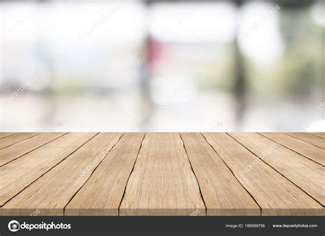 Empty Wood Table Top On Blurred Background Stock Photo By ©sorrapongs