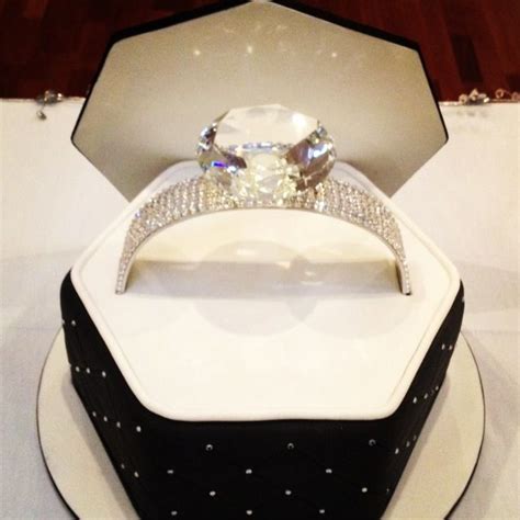 Scour stores for interesting items which could be upcycled to function as your group box for years to come. Bling engagement ring cake #sweetlysliced | Engagement ...