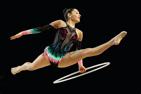 Whats The Difference Between Artistic And Rhythmic Gymnastics Prepare To Be Wowed By Team Usas