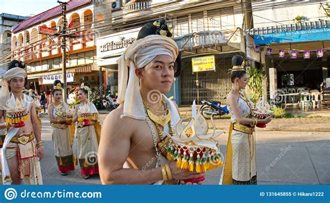 thai people in thai lanna traditional dress in the parade for promoted 46th thailand national