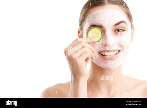 Close Up Shot Of A Smiling Beautiful Young Woman Wearing A Face Mask