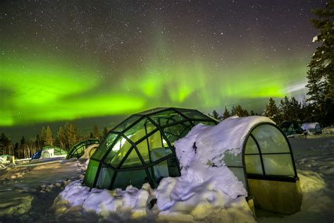 travel northern lights at kakkslautanen glass igloo aurora borealis northern lights photo