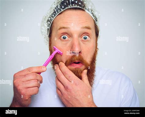 Man Adjust The Beard With A Razor Blade Stock Photo Alamy