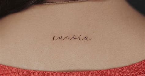 Eunoia Lettering Tattoo On The Upper Back