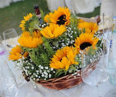 Read on to see which one you should pick. 30 Sunflowers table centerpieces add Sunny yellow color ...