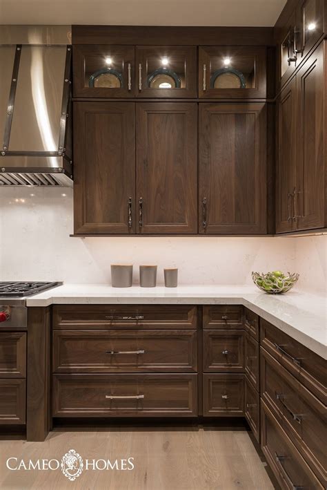 If necessary, apply a second coat to get a darker color, or combine stain colors for a custom mix. Walnut cabinets, white quartz counters. | Farmhouse style kitchen cabinets, Kitchen cabinet ...