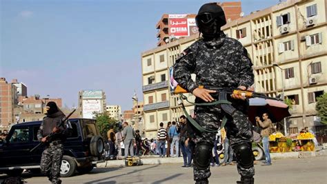 Masked Egyptian Security Forces Deploy In The Cairo Suburb Of Matareya On The Day Islamists