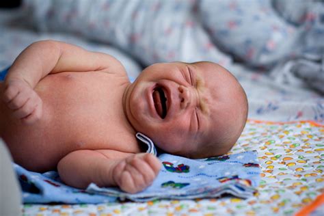 Online Crop Baby Crying While Lying Down Hd Wallpaper Wallpaper Flare