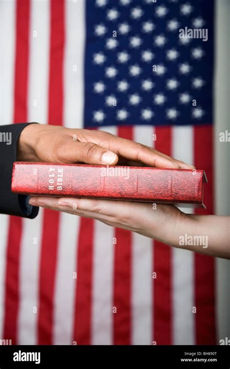 Detail Of A Man Swearing On The Bible Stock Photo Alamy