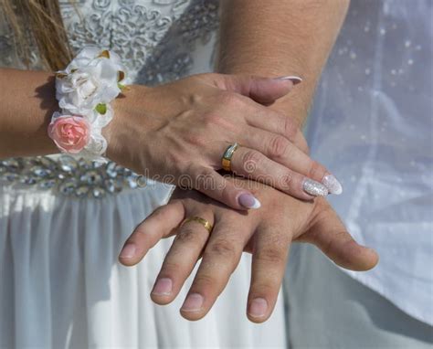 Closeup Of Bride And Groom Hands With Wedding Rings Stock Image Image Of Holding Pair
