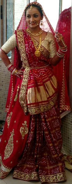 Gujarati Bride In Traditional Panetar Lehenga And Gharchola Saree Nidhi Sagar Indian Bridal