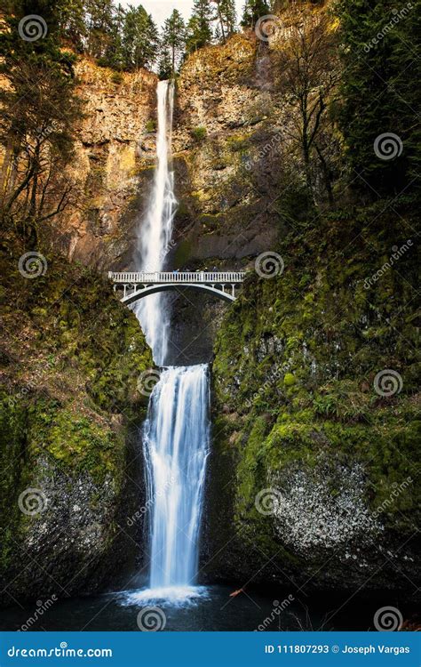 Multnomah Falls And Walking Bridge As The Sun Sets In Oregon Stock