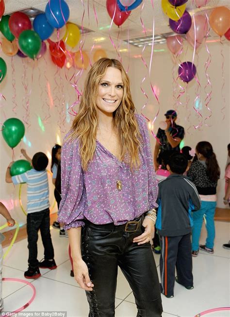 Awesome marchesa wedding dress for sale today wedding dresses. Molly Sims covers up in elegant long silk dress and ...