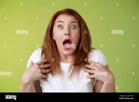 Shocked Panicking Redhead Middle Aged Woman Gasping Drop Jaw Open Mouth Stare Camera Freak Out