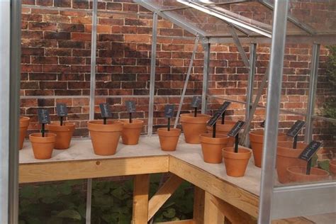 A greenhouse provides a place for your plants to grow in a controlled environment, right in your own use this guide to learn how to build a diy greenhouse from the ground up or from a greenhouse kit. DIY Greenhouse Bench | Greenhouse benches, Diy greenhouse ...