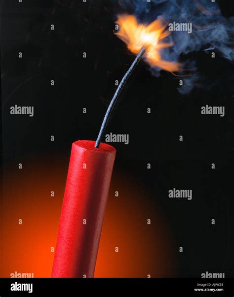 Stick Of Dynamite With The Fuse Burning Stock Photo Alamy