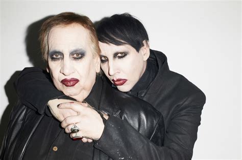 marilyn manson and his father pose in makeup together