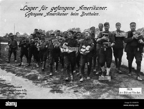 2 g55 k1 1917 1 american pows carrying bread wwi 1917 history world war i prisoners of war camp