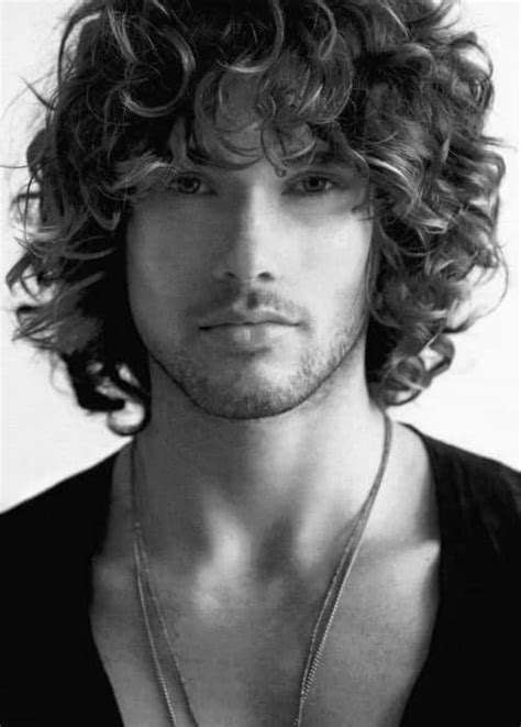 Another cool look for curly hair that features a hair design on the sides. 50 Long Curly Hairstyles For Men - Manly Tangled Up Cuts