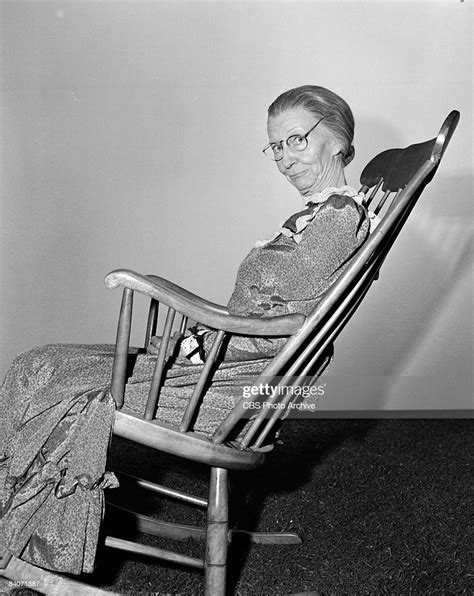 Irene Ryan Sits In A Rocking Chair While Playing The Part Of Granny
