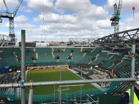 The roof, designed from waterproof tenara fabric, takes about 10 minutes to close. Wimbledon - Court No 1 Retractable Roof - Glass Facades