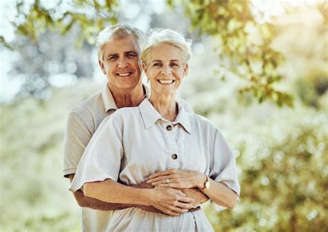 Premium Photo Senior Couple Hug In Park Love And Marriage Portrait